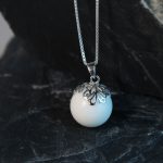Muttermilchschmuck Perle mit Rankenkappe silber